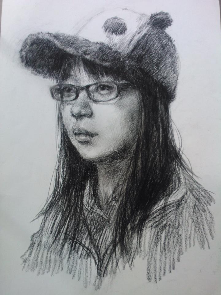 A portrait drawing done in an art class.